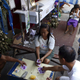 Mourners play cards near a coffin during a funeral wake in Paranaque city in Manila.